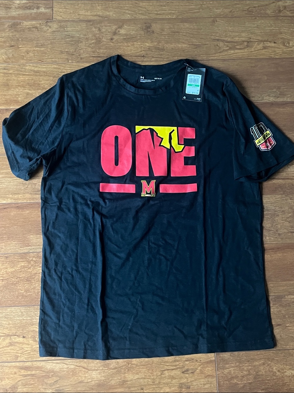 Maryland Under Armour Black Tee with Red and Yellow ONE Graphic